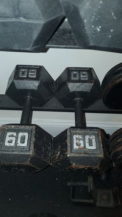 Two 60lbs dumbells $1 per pound