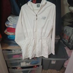 Brand New Never Worn Water Proof New Balance Rain Jacket Size Medium With Waist Drawstring To Tighten If Like 