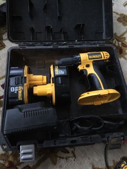 Two batteries charger and drill 18 volt