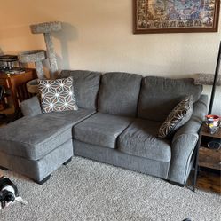 Gray Couch With Movable Ottoman 
