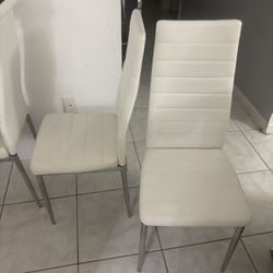 White Leather Dinninng Table Chairs 