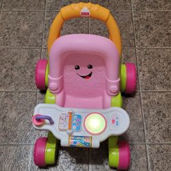 Walker Kids/baby Fisher Price Stroller and Learn Toys.  Light Up  Used. In Good Condition 