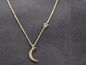 GOLD TONE MOON STAR NECKLACE