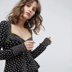FREE PEOPLE Black Floral Kissin Kate Contrast Trim Long Sleeve Henley Top