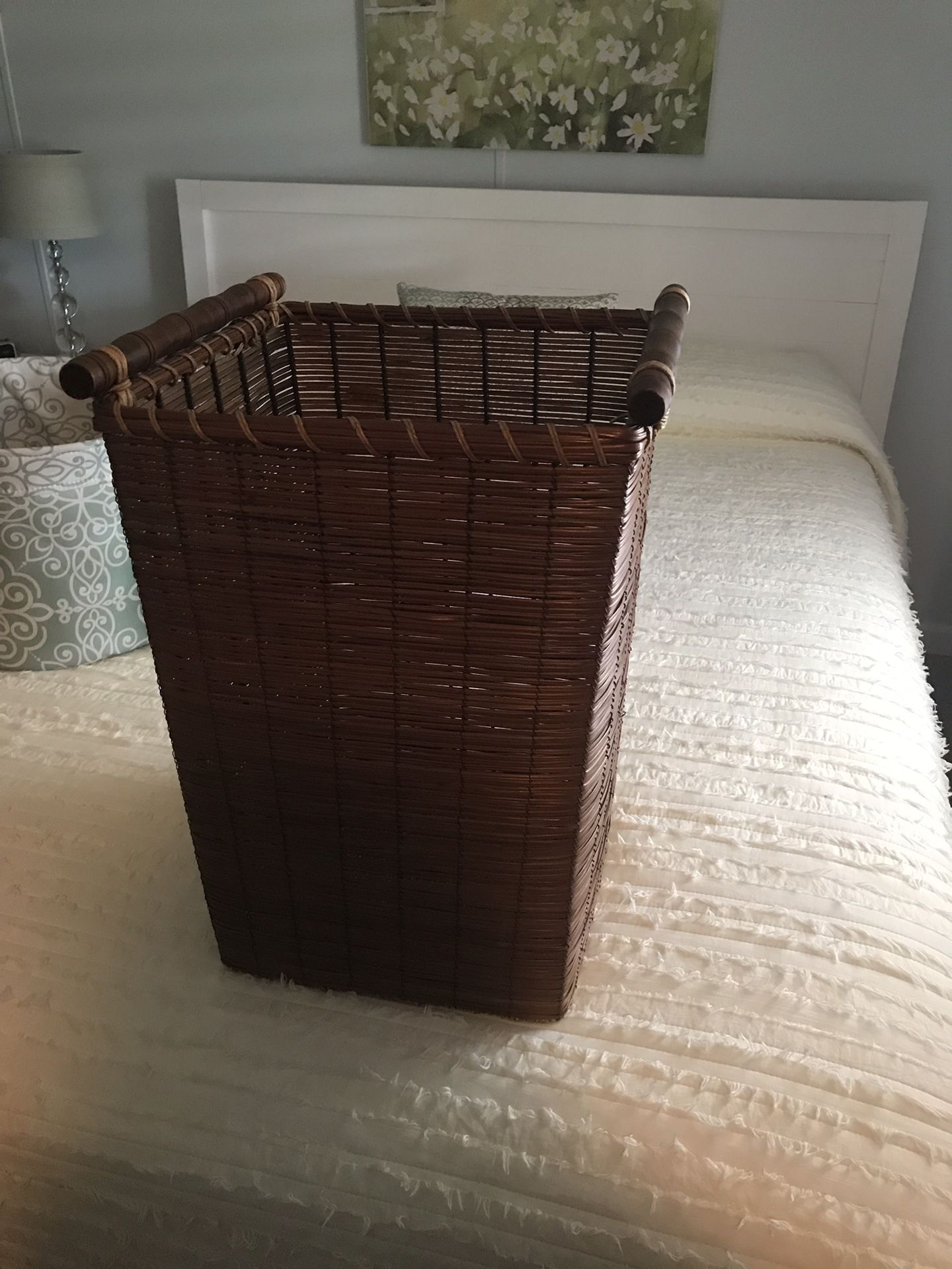 Small brown wooden hamper or storage container
