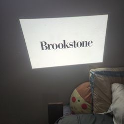 Brookstone  Mini Projector 