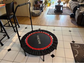 Rebounder trampoline with handle