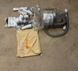 Oneisall Vacuum Cleaner with Accessories (brand new) never used.