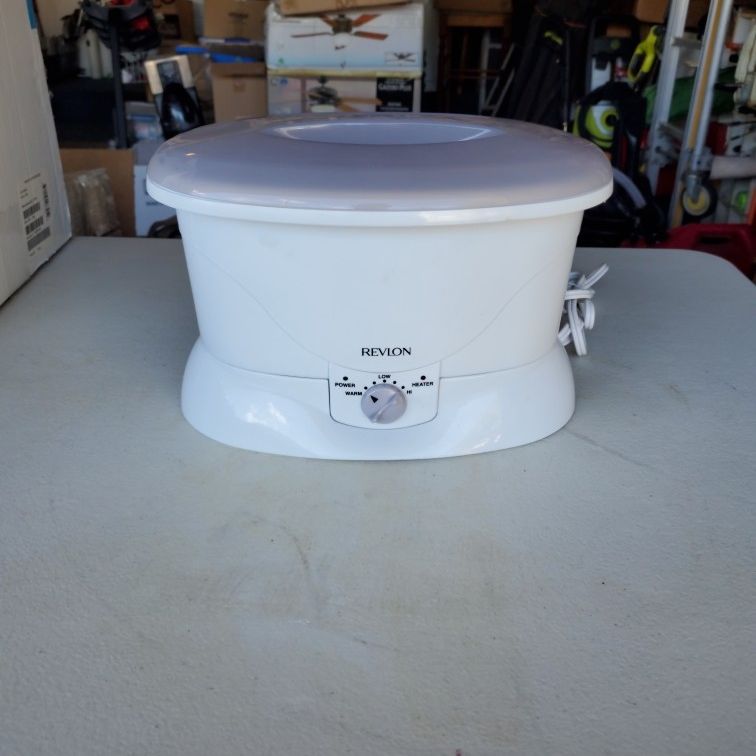 REVLON RVS1213 PARAFIN WAX WARMER WITH INSTRUCTIONS.