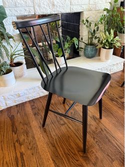 4 black metal chairs