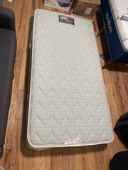 Twin-sized, spring mattress FREE