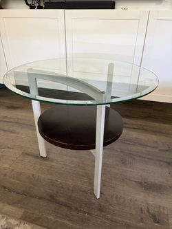 25-inch round 2-tier glass coffee/cocktail table