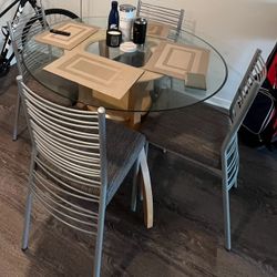Modern Glass Top Dining Table with Wooden Base & 4 Chairs - Gently Used