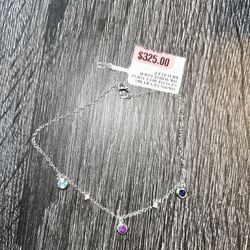 10k White Good Blue Topaz Bracelet 