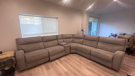Large gray power reclining sectional sofa in very good condition.