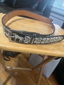 $50, Men’s belt size 44
