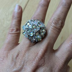 Rare Vintage Clustered Hearts Silver Aurora Borealis Rhinestone Ring 1.5". Adjustable, One Size. Classy Elegance!

This vintage ring features a cluste