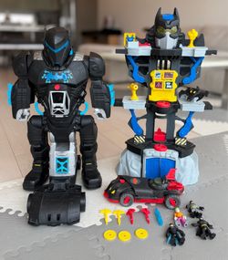 3 Batman Toys: robot, batcave, Batmobile