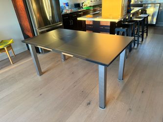 Kasala Modern glass top dining table