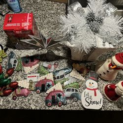 Assorted Christmas Ornaments And Cookie Cutters