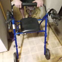 Blue 4-wheel rollator walker