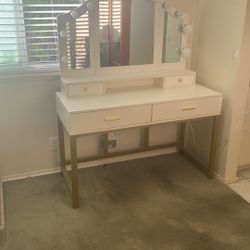 White lighted makeup desk