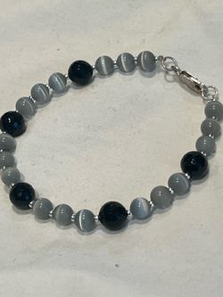 Cats eye and black onyx sterling silver bracelet