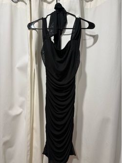 Black mini dress with open back