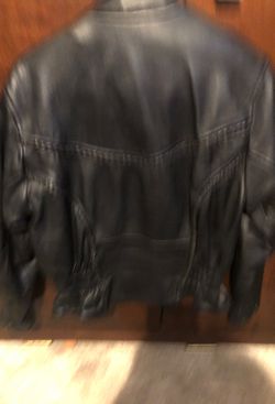 Beautiful leather jacket size large and Heavy for riding