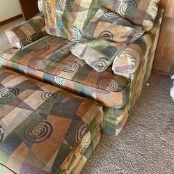 Lazyboy loveseat with ottoman that opens into a twin bed. Folding Bed