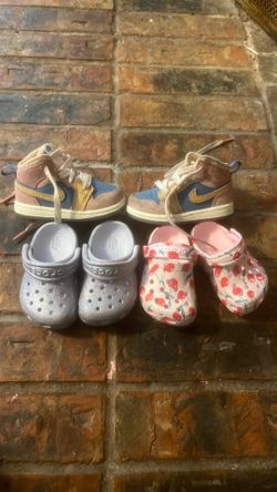Baby girl crocs and Nikes
