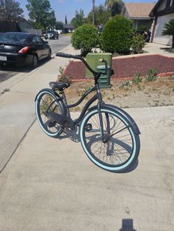 Womens Huffy cruiser bike light blue tires rides good