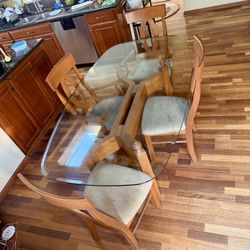 Indoor glass table with 6 chairs