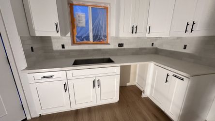 Kitchen Cabinets, Quartz Countertops, Ceramic Tile