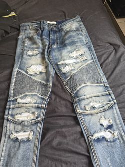 Ripped white patched jeans