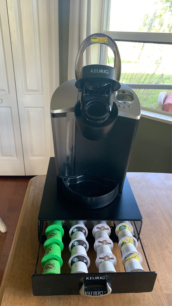 Keurig coffee maker with pod storage organizer and pods for Sale in