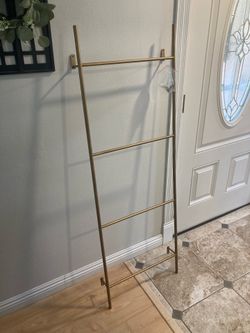 Lauren McBride hanging iron wall ladders
