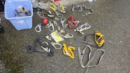 Set of two-piece fall arrest lanyard with rebar hook.