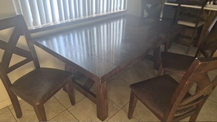 Dinner table with chairs
