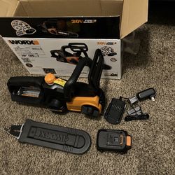 New Worx WG322 20VMax Power Share 10” Cordless Chainsaw (See & Click On Pictures). Never Been Used. Battery & Charger Included