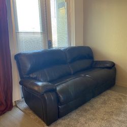 Ashley Two Sided Recliner Sofa.