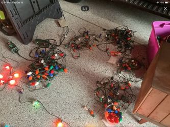 Vintage Christmas lights both large and medium size bulbs there are Four - 26 foot strands with large bulbs C9 bulbs Six - 26 foot strands with mediu