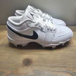 Jordan 1 low kids cleats white  and black sz 4y Baseball/Football