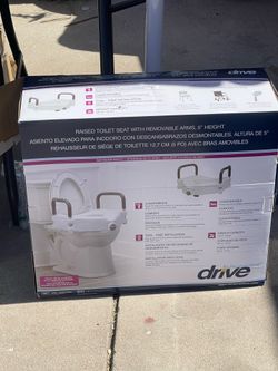 Toilet seat lifter