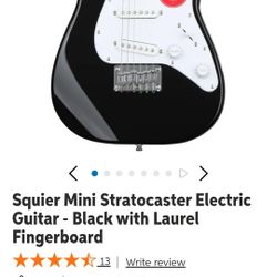 Mini Squier Stratacaster electric guitar