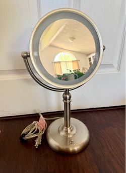 Double-sided zoom mirror