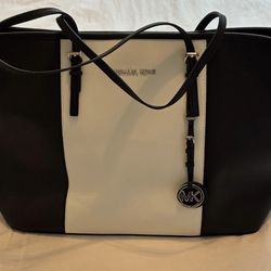 MICHAEL Michael Kors Jet Set Travel large tote bag in black and white Saffiano leather.