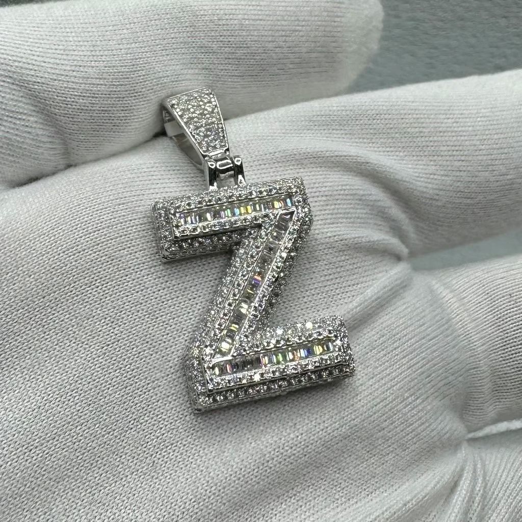 A Moissanite Initial in Sterling Silver with a CTW of 2.21 in Bugget Style