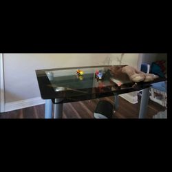 Glass top dining table
