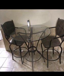 Glass table top kitchen set with 3 high chairs
